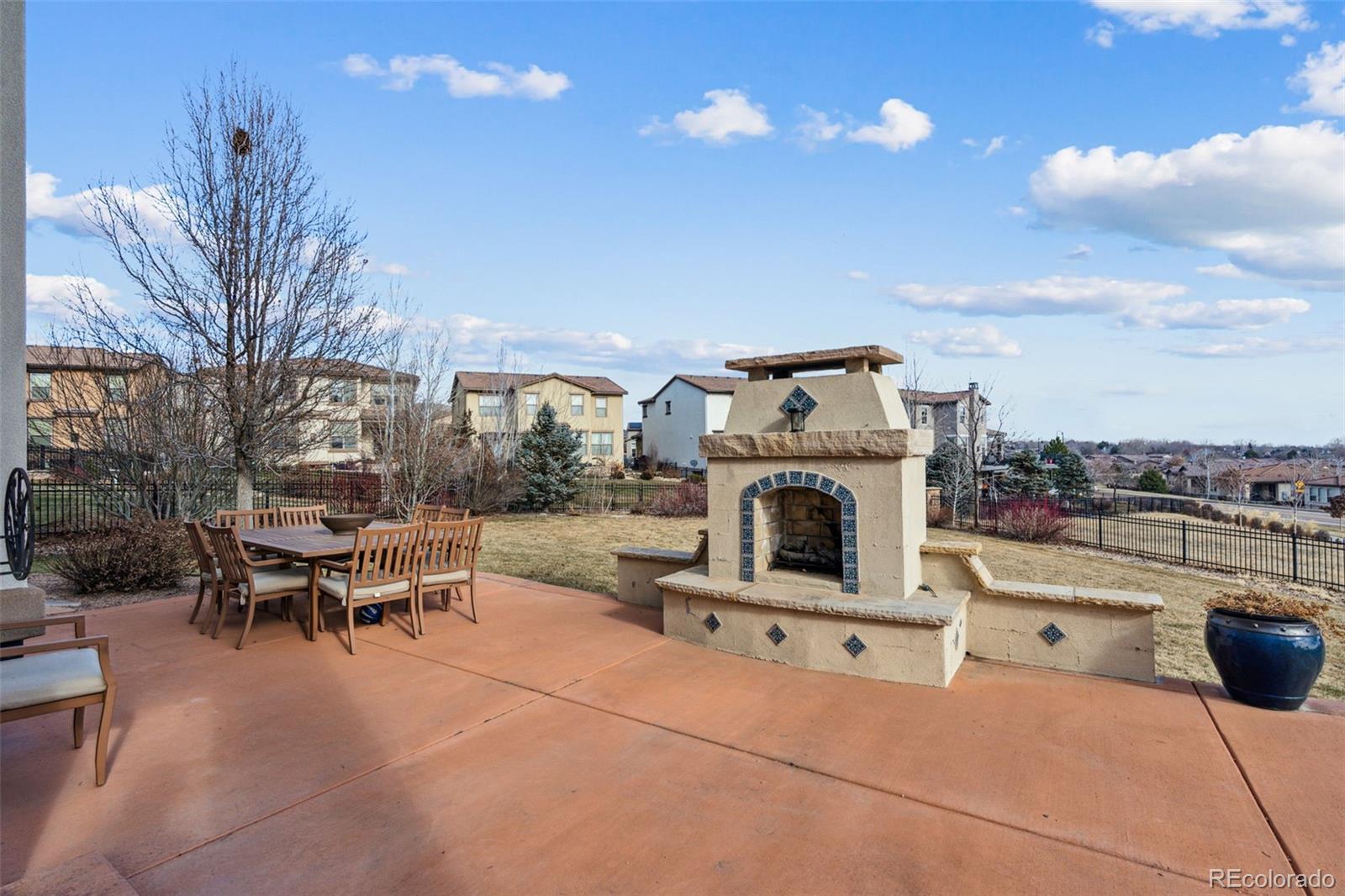 Cozy outdoor gas fireplace - expansive patio