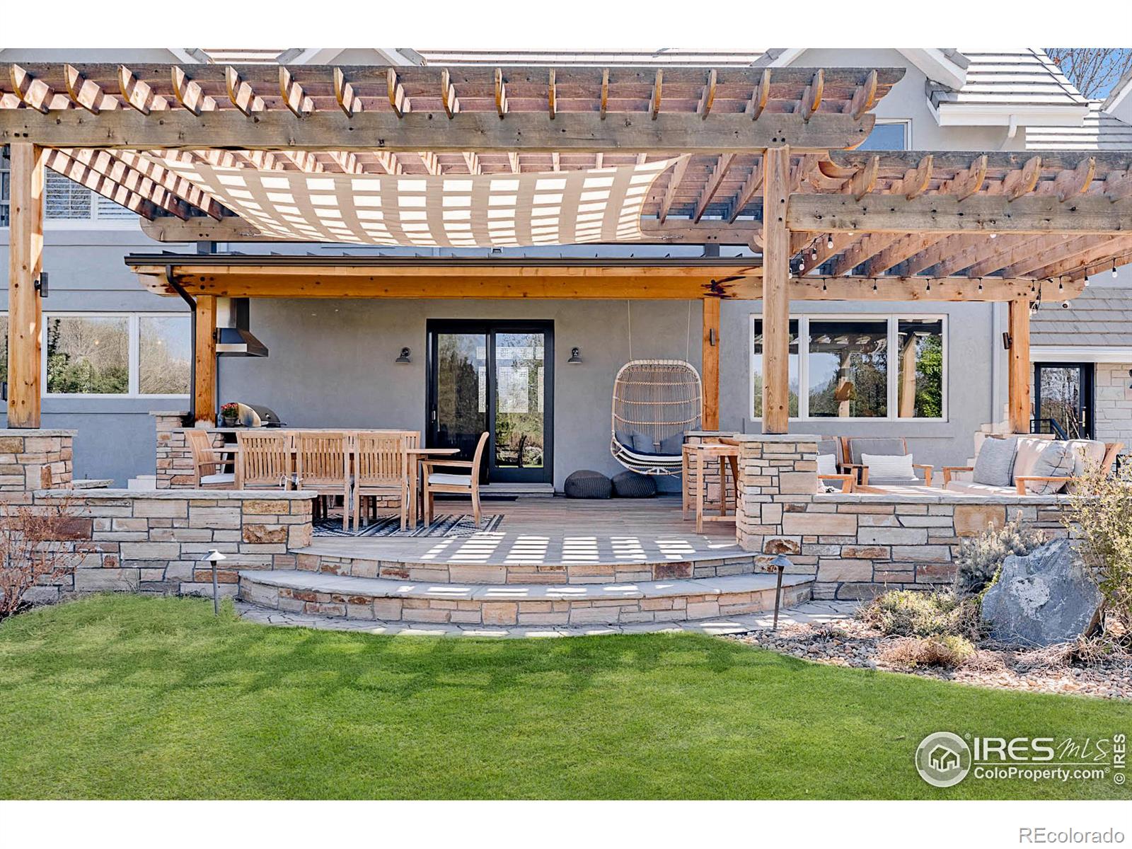 Back Patio with pergola and summer kitchen