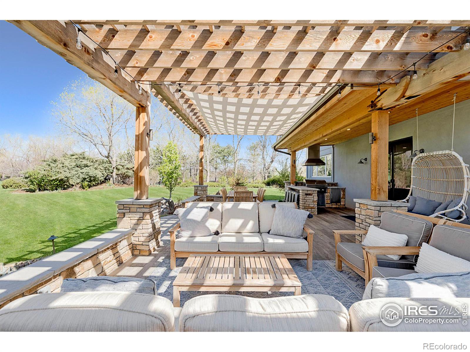 Back Patio lounge area & pergola