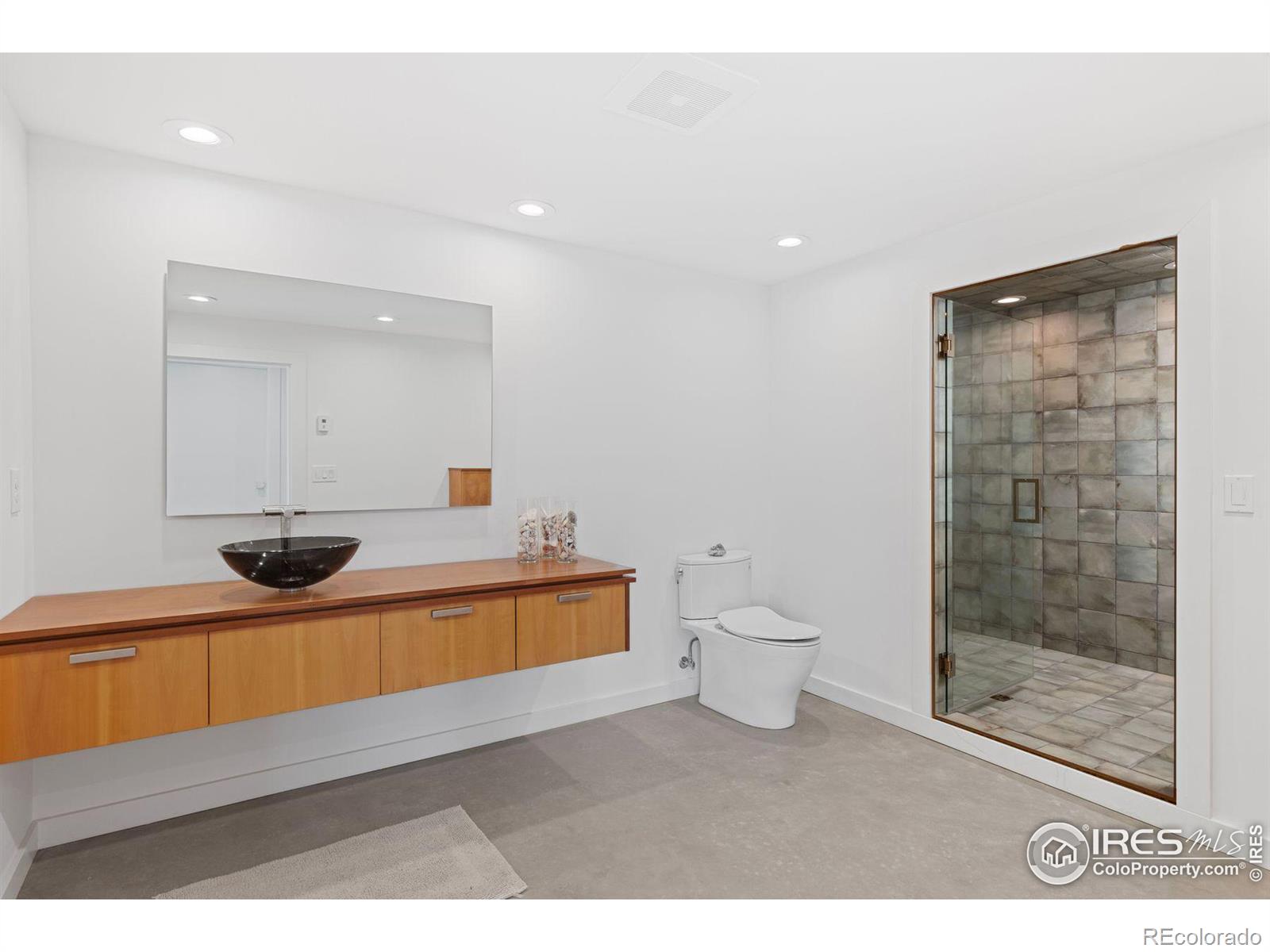 Lower Level Bath with Oversized Walk-In Steam Shower