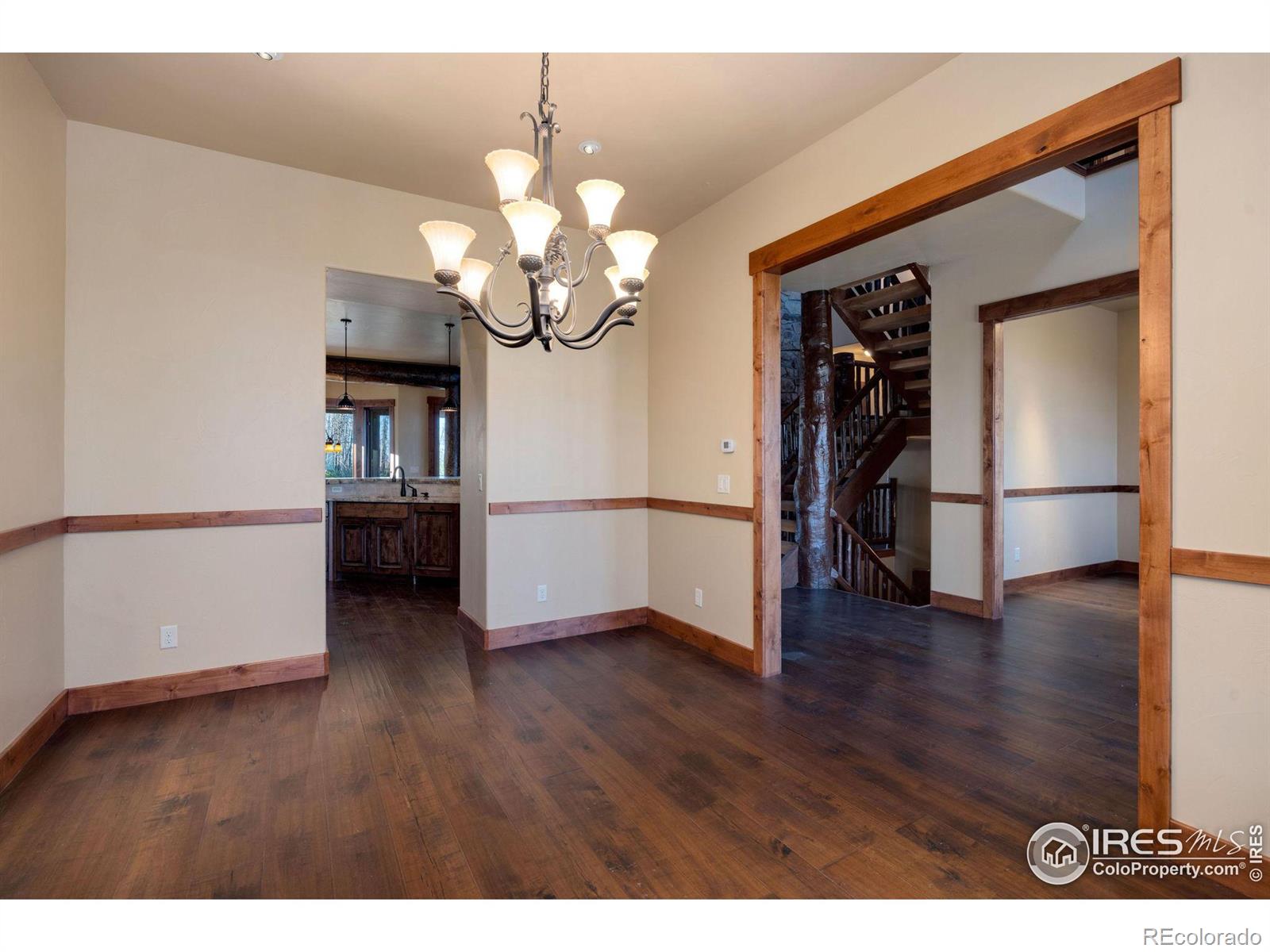 Formal dining area off of main kitchen next to foyer and across from the office