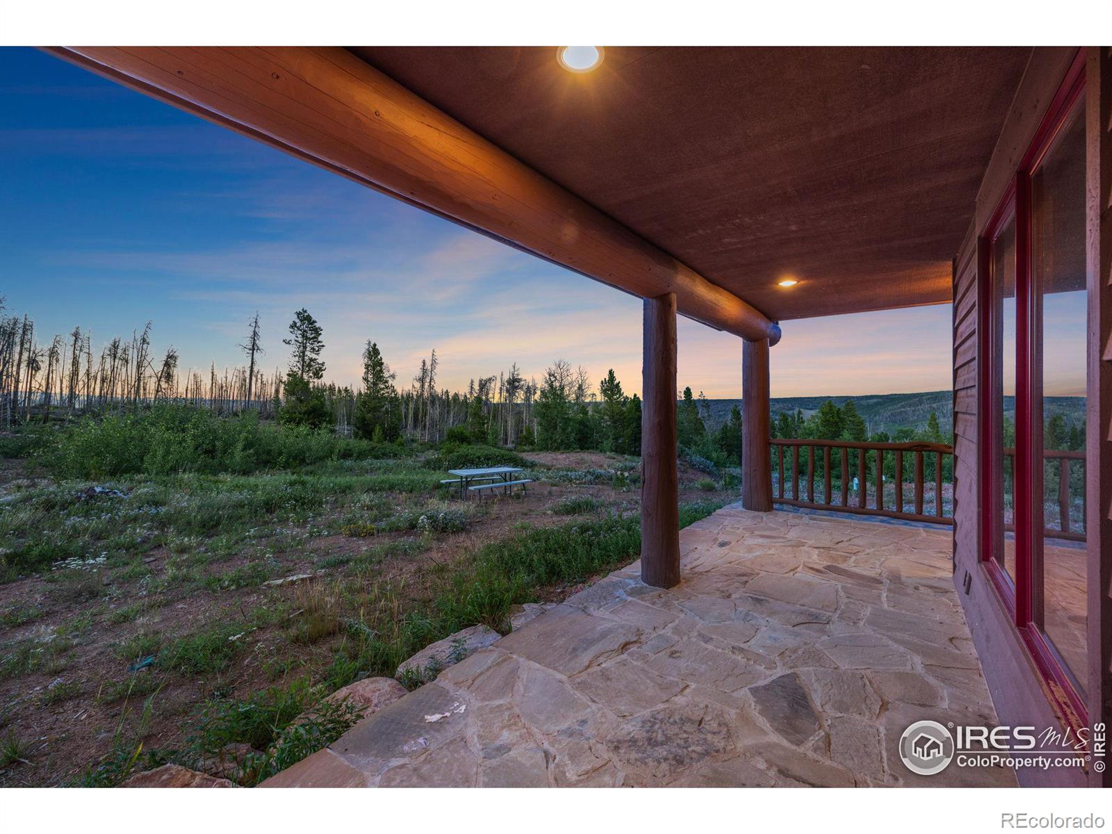 View from the back porch to the east looking over at the designated fire pit