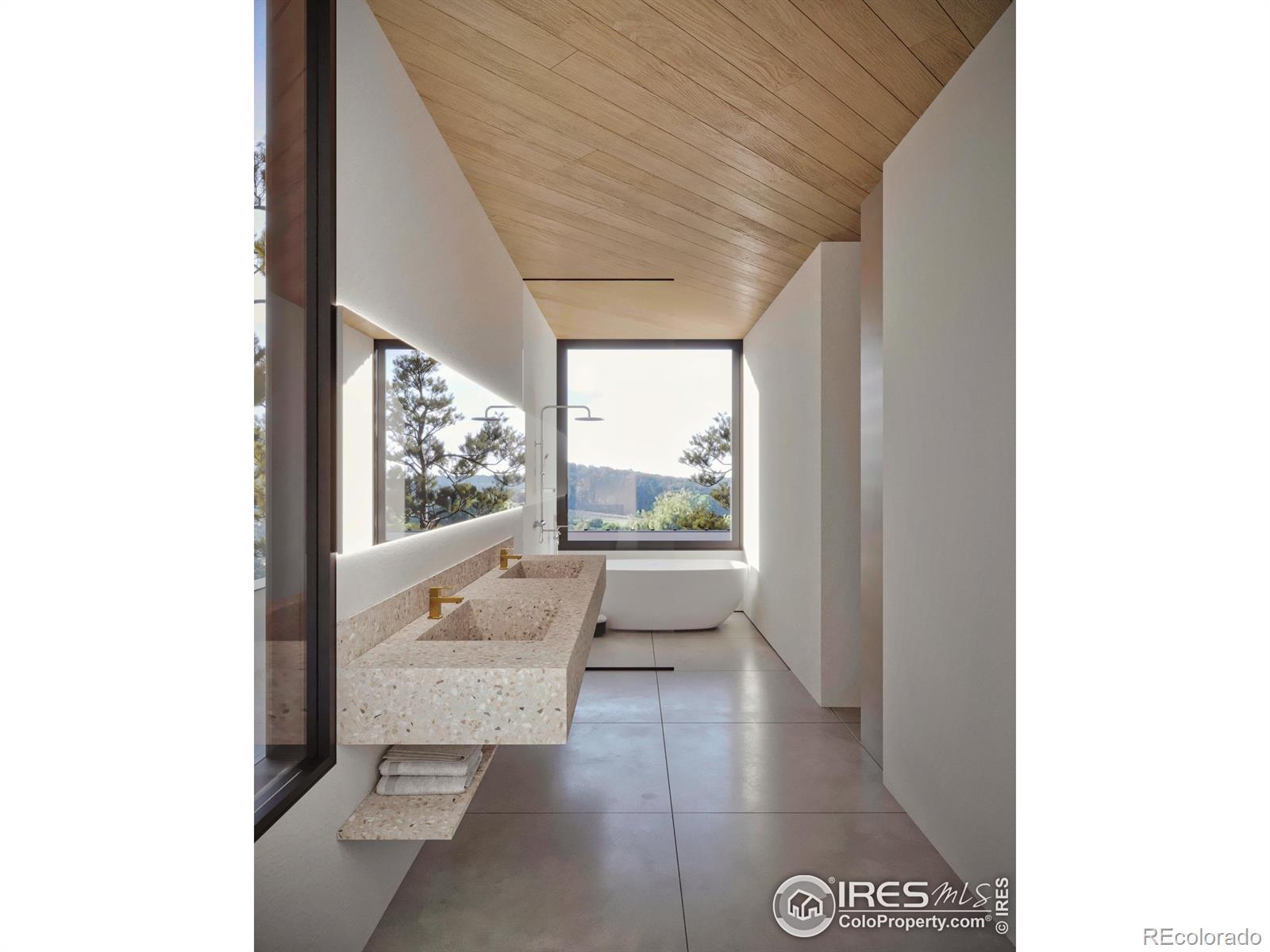 The en suite spa bathroom features a large wet room shower and freestanding soaking tub, a private water closet and a floating terrazzo double vanity.