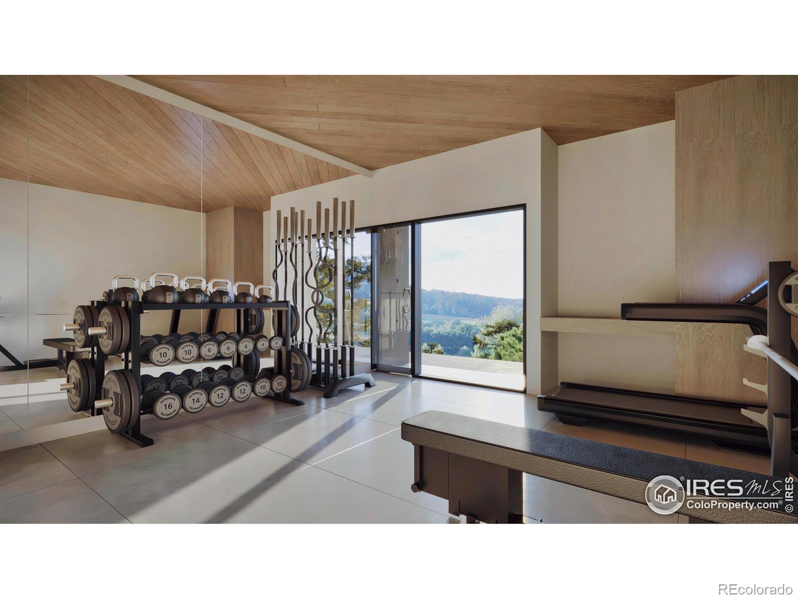 The home gym gets pulses racing with a built-in wet bar and attached patio with wide-open treetop views