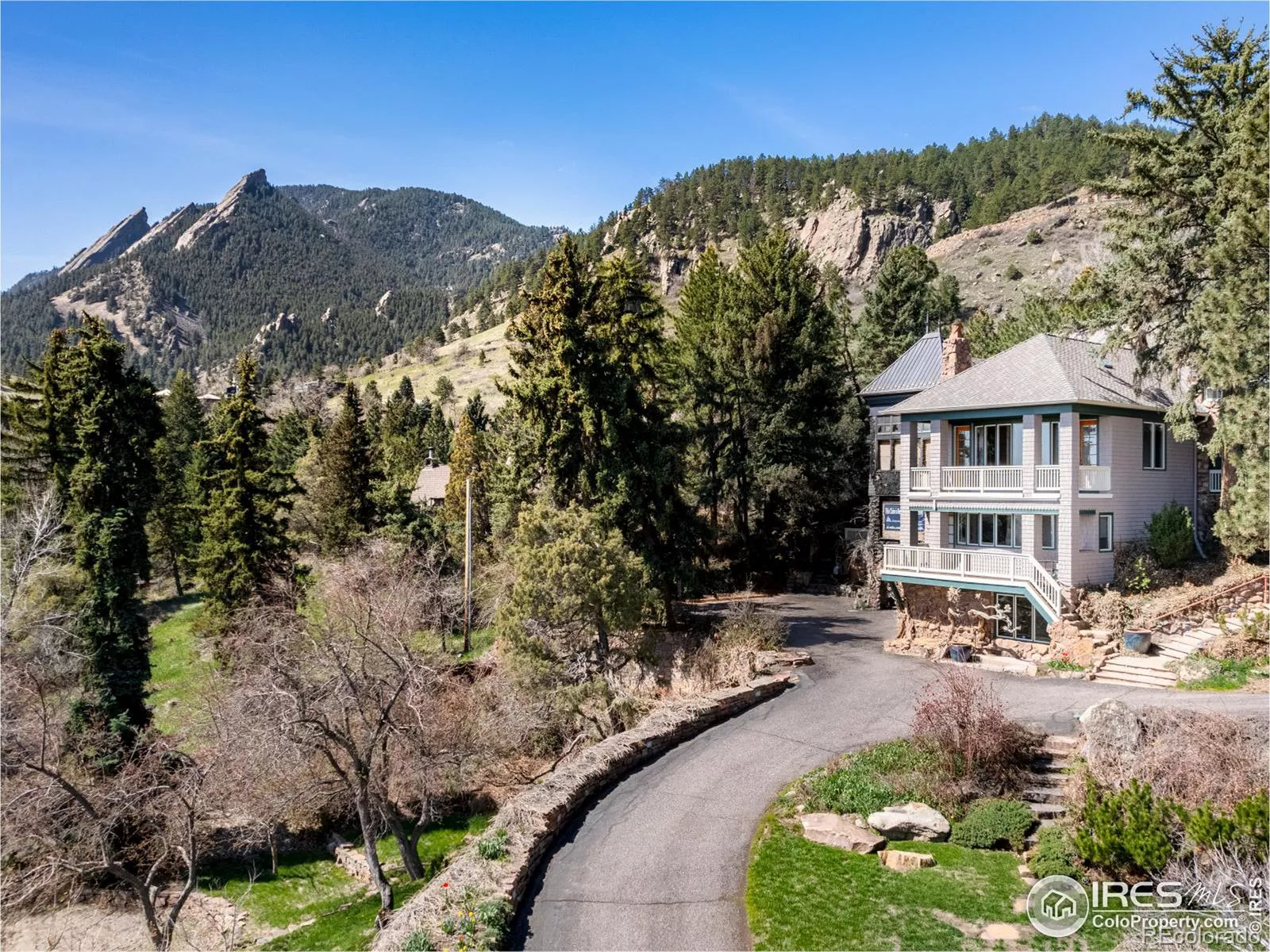 Welcome to 1033 5th Street! Ultra-rare 10,000+ sq ft home on a 2 acre parcel in West Boulder.