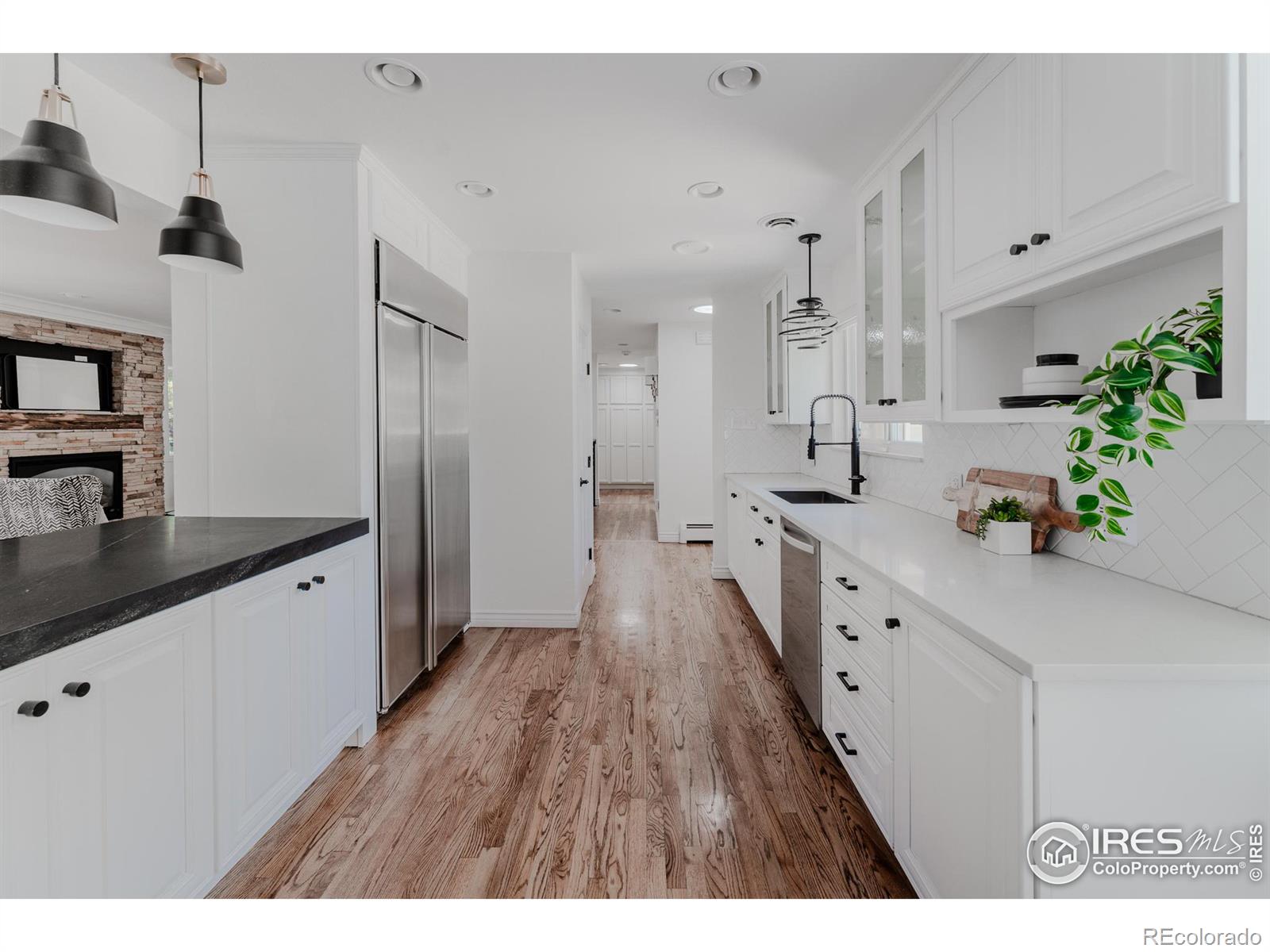 An abundance of cabinets and counter space provides ample storage and ample room for meal preparation.