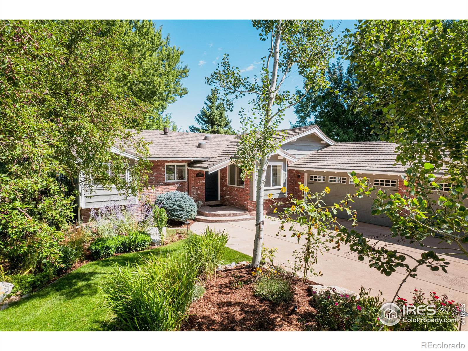 Whether its housing vehicles, outdoor equipment, or seasonal decor, this expansive three car garage ensures that everything has its place. A 50 year stone coated metal roof is an added bonus.