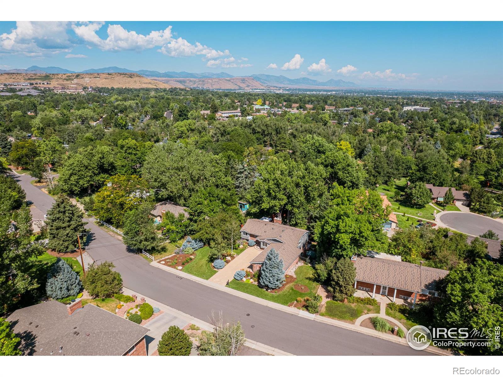 This home, with its generous .38 acre yard, provides a serene retreat just 15 to 20 minutes from the vibrant heart of downtown Denver or the breathtaking majesty of the mountains.