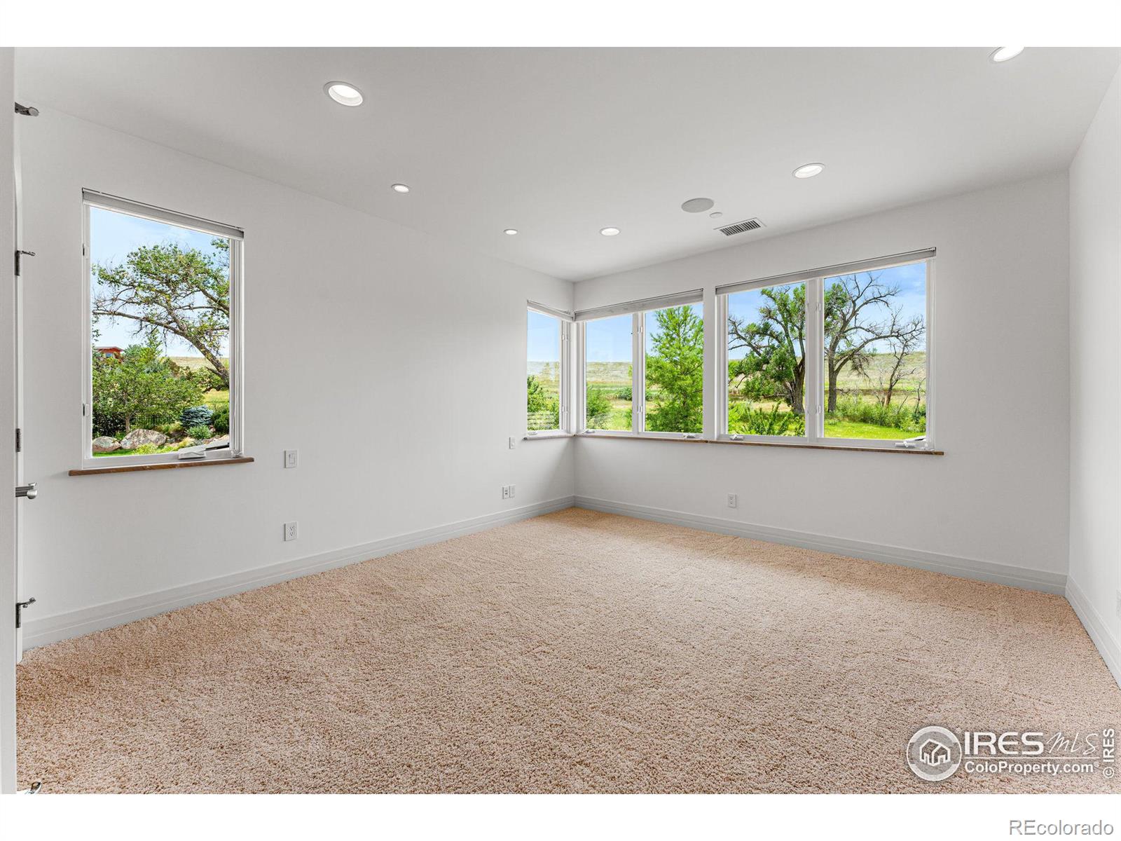 Upstairs bedroom with open space views