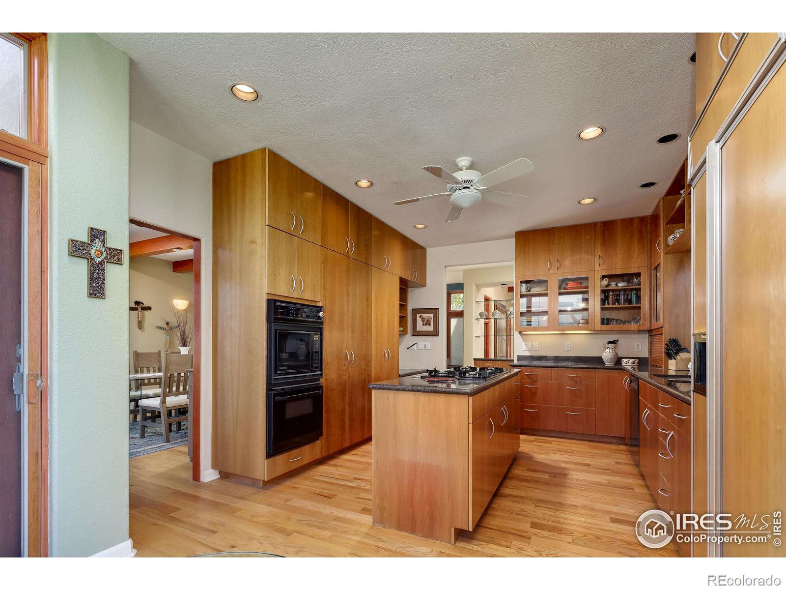 A beautifully designed dining room with beamed ceilings and stunning vistas