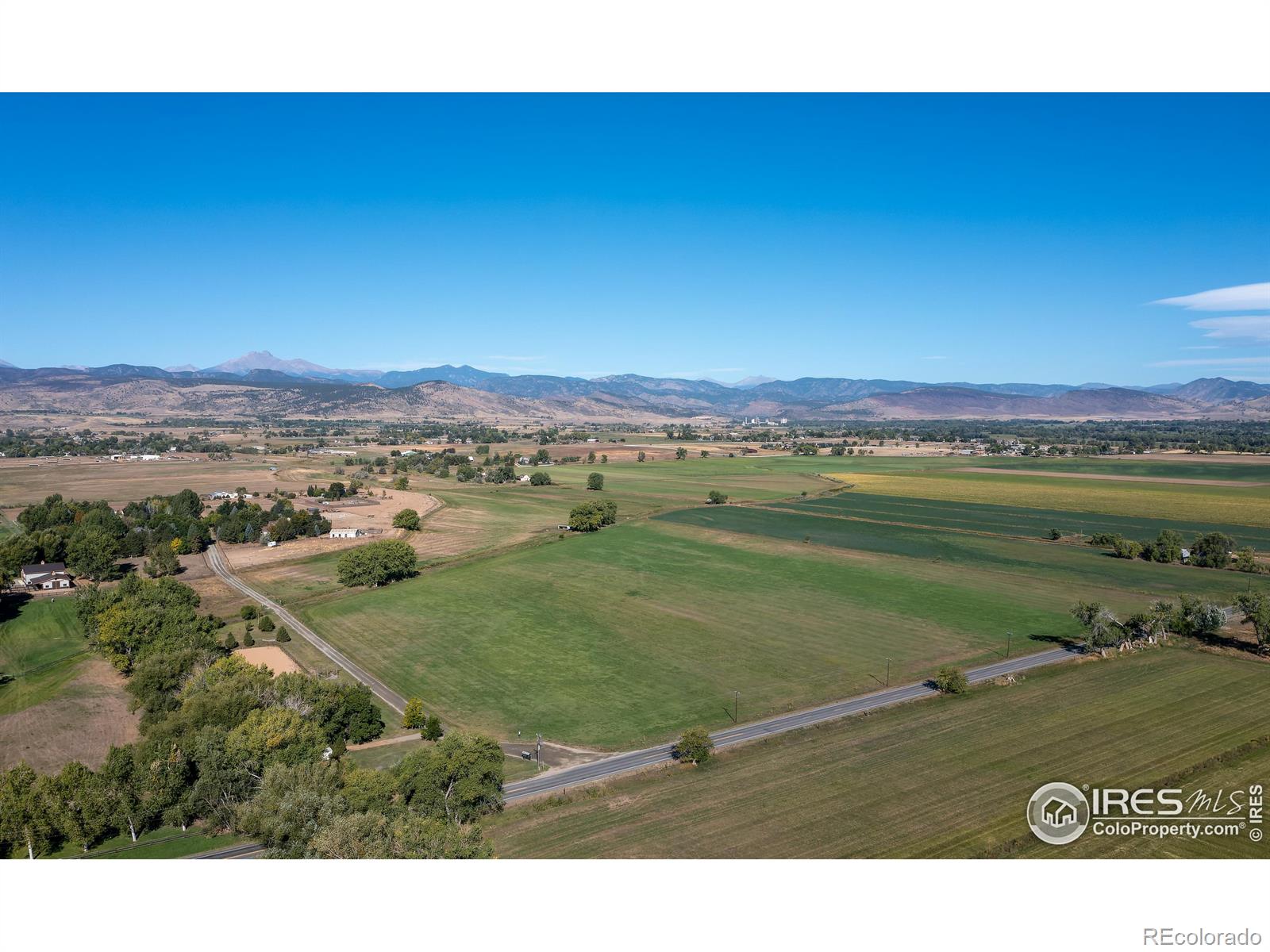 Productive hay fields with shed and irrigation ditch