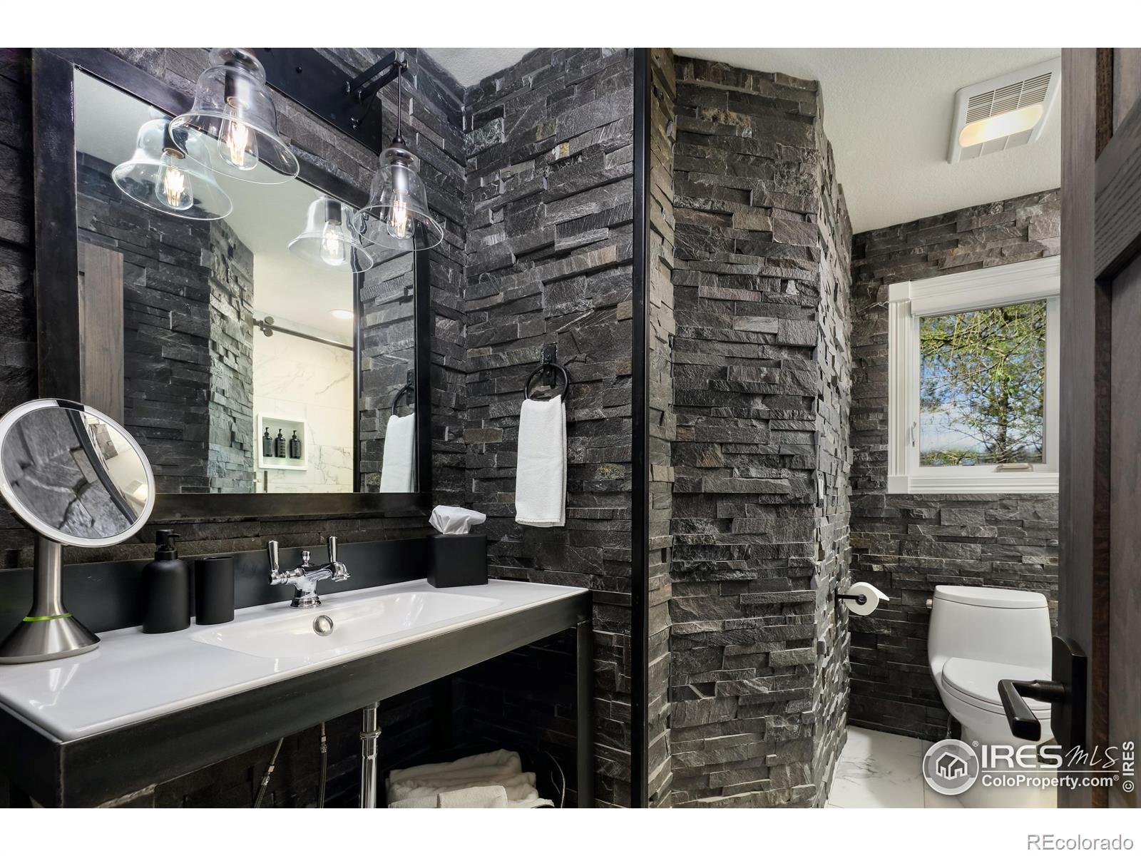 Bathroom 2 with freestanding custom-made sink and Italian tile