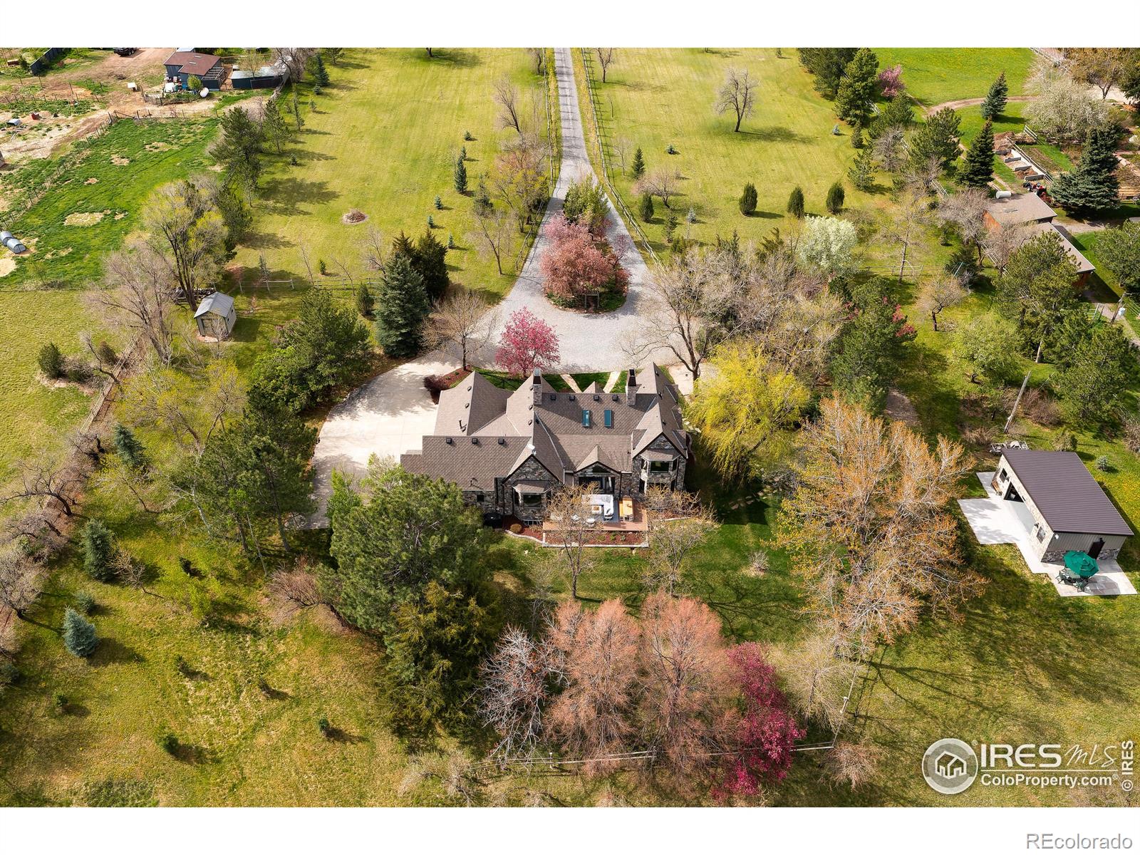 10 acres nourished by 10 shares senior water rights. 1/4 acre lake. Ornamental pear tree lined private driveway