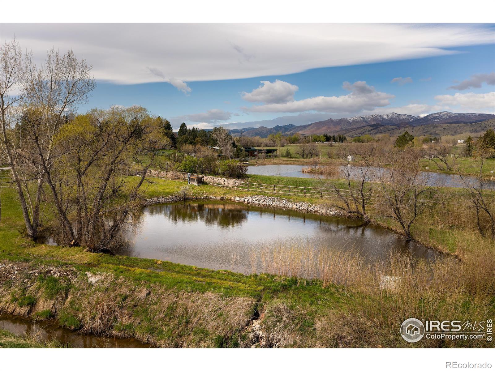 1/4 acre lake with views. 10 shares of absolute/senior water rights. Front and back acreage is irrigated via high end, app controlled commercial grade Rainbird sprinkler with owned, free water.