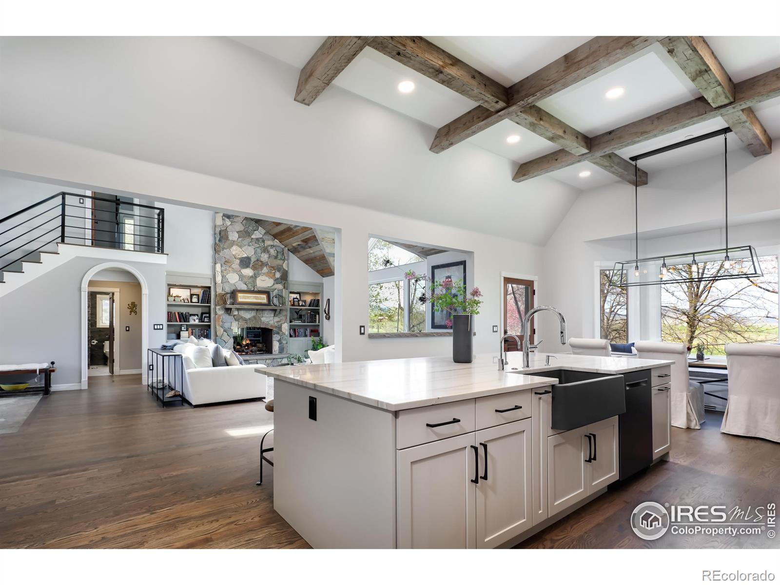 Open floor plan, high ceilings, gorgeous natural light and inviting and cozy throughout.