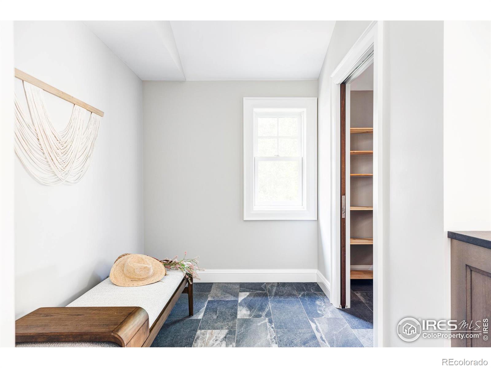 Spacious mudroom with storage.