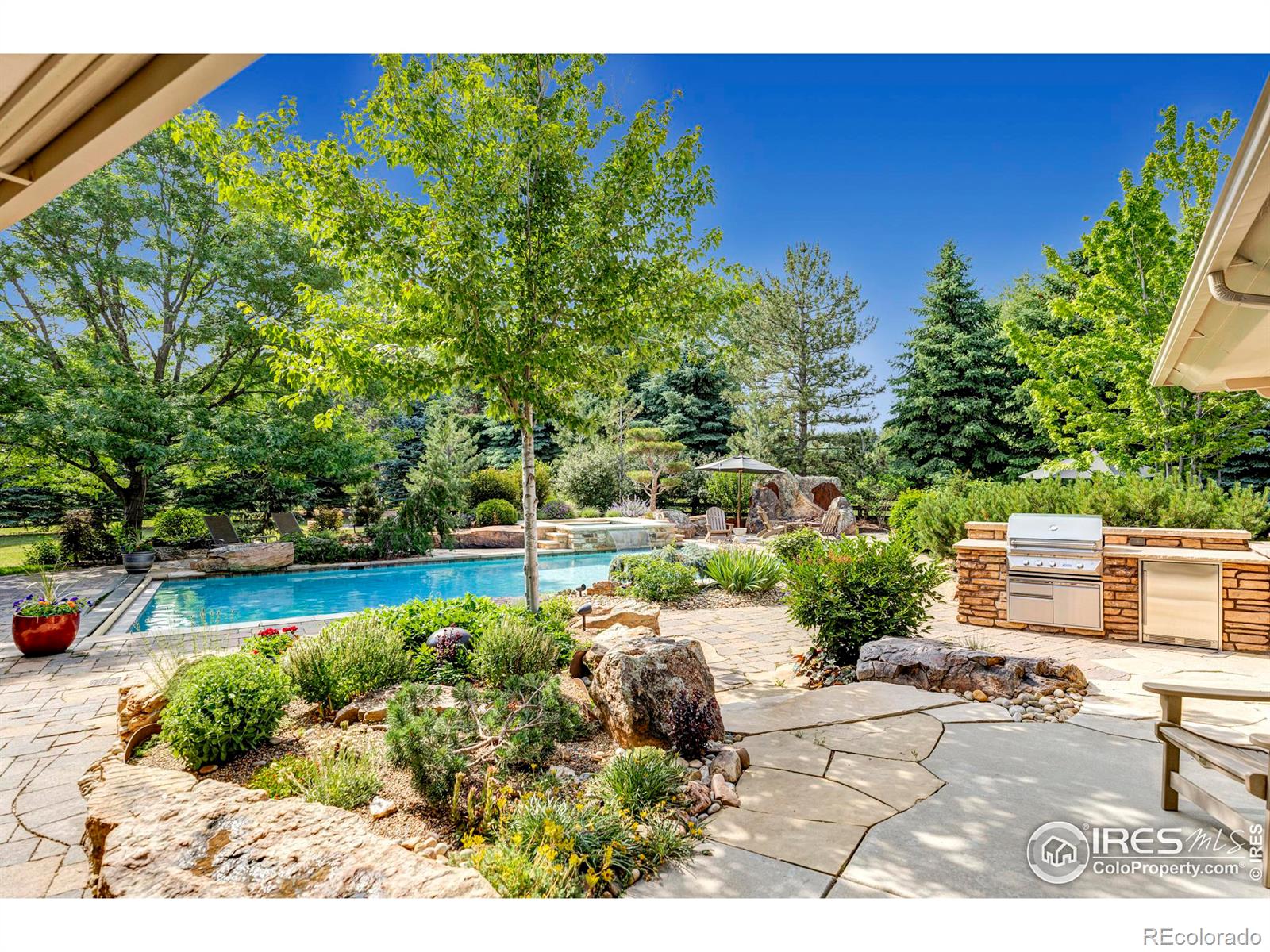 Lovely stone terraces and well equipped summer kitchen.