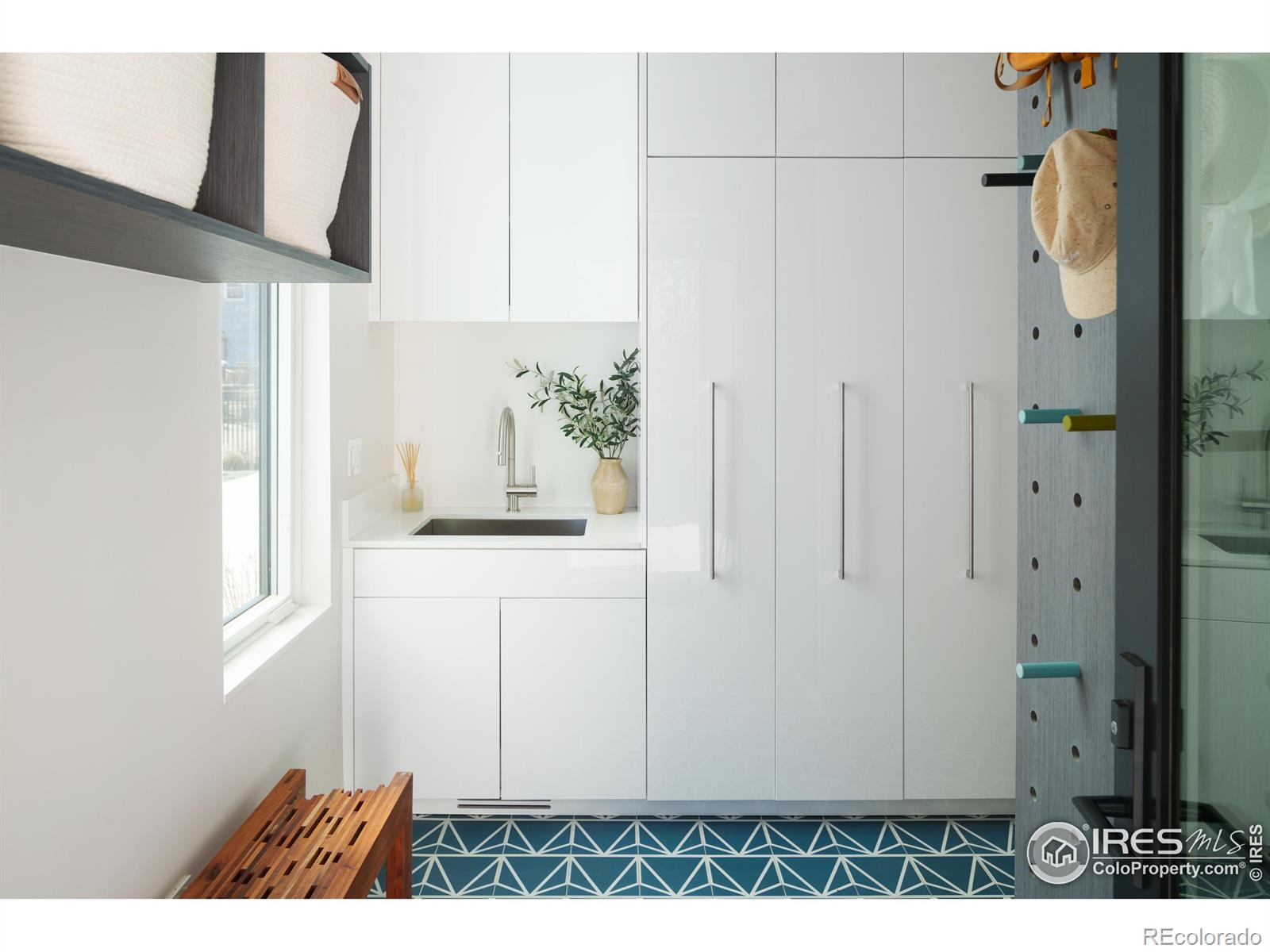 A separate mudroom entry provides easy access to the detached two-car garage.