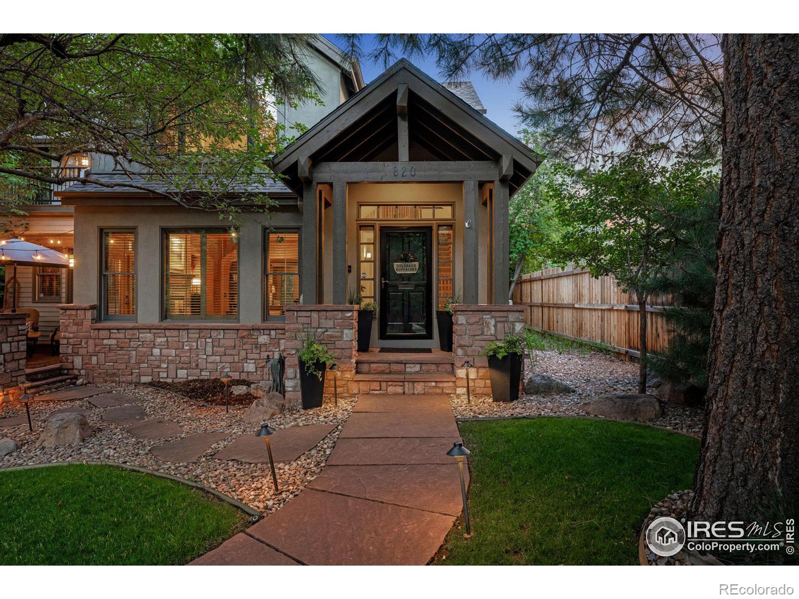 Rock and Stone construction with great front patio capturing the views