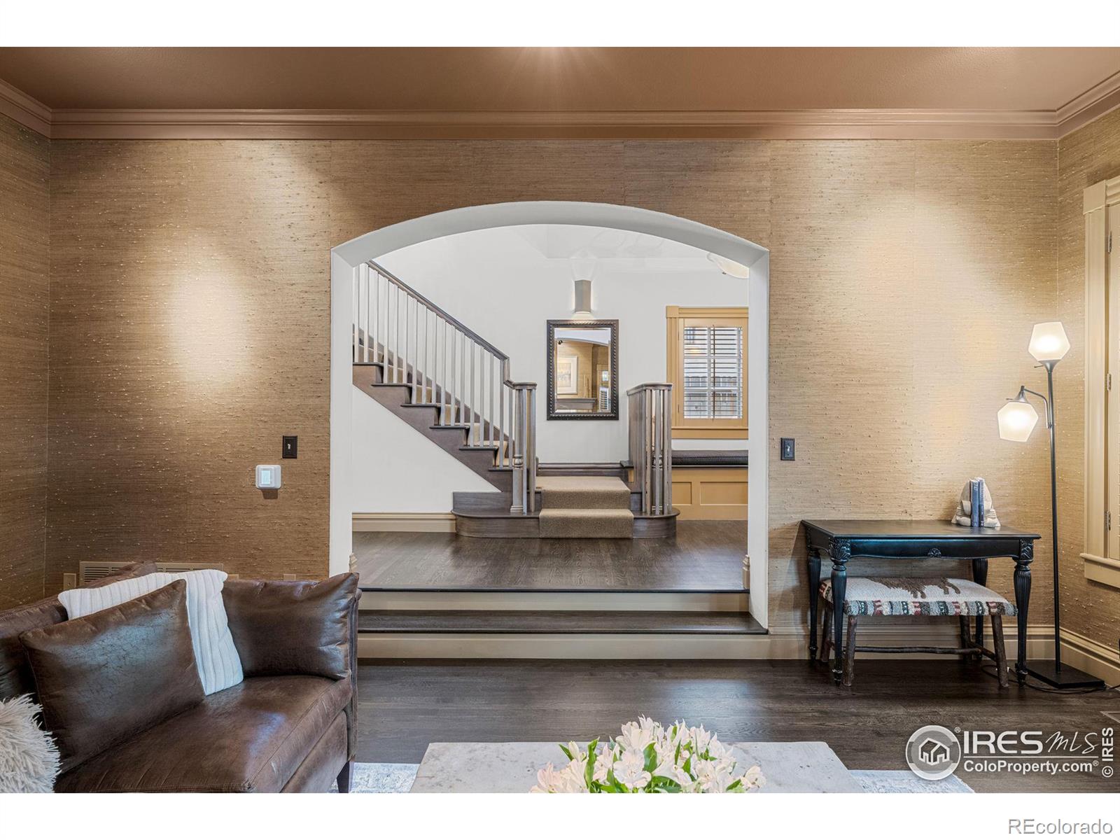 Comfortable living room - stunning architecture, fireplace and mountain views.