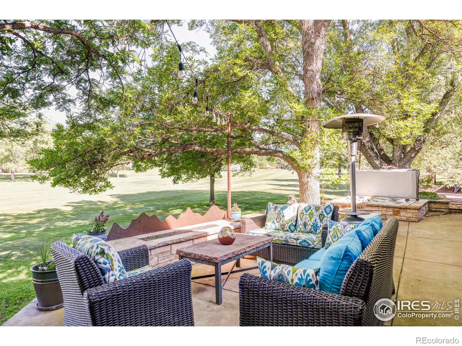 The elegant sliding glass room divider seamlessly connects the sunken family room to a versatile flex space.