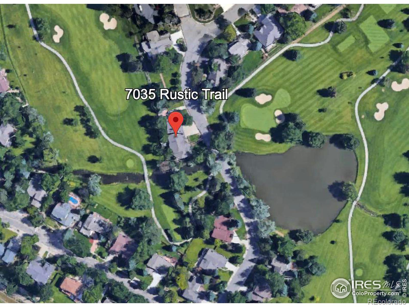 Aerial view of property, showcasing the surrounding private golf course and pond. Source: Google Earth.