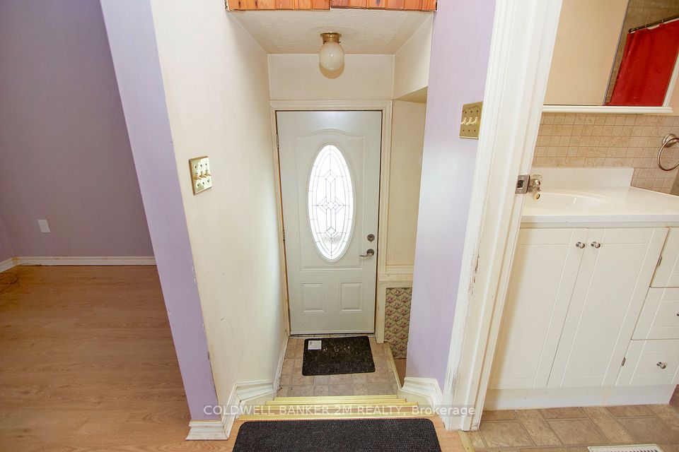 Side Entrance with Access to the Lower Level.