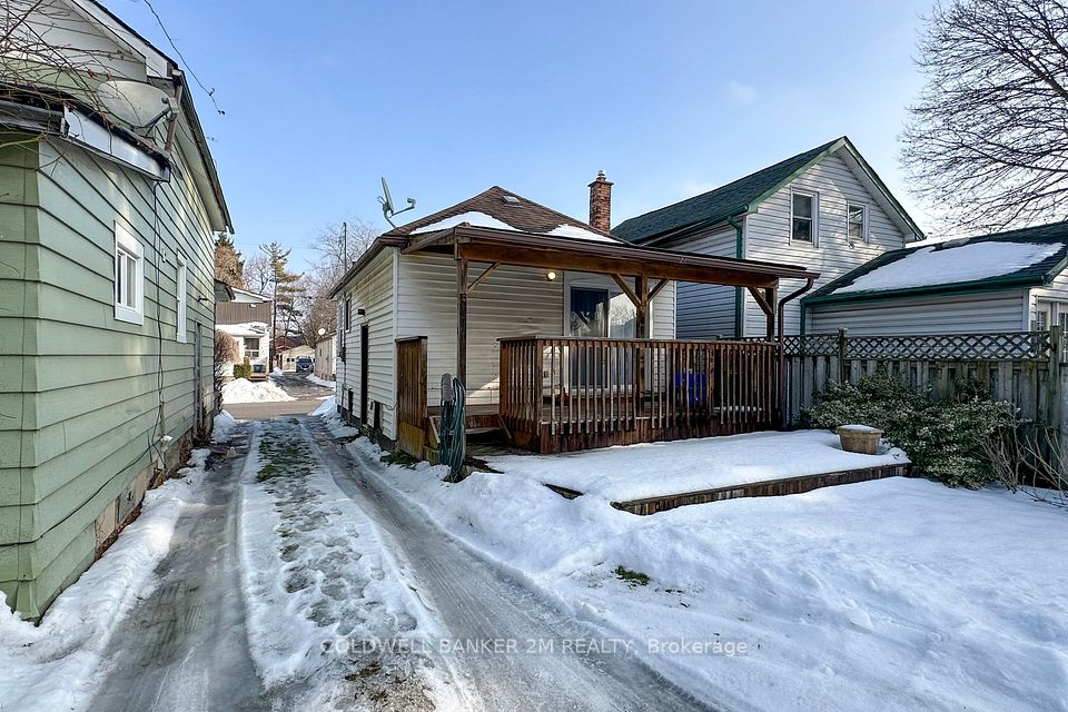 Mutual Driveway & Covered Deck in the Backyard.