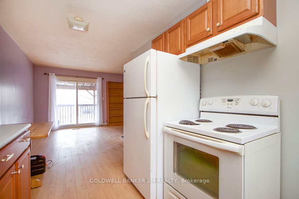 Kitchen Looking into the Dining & Living Room.