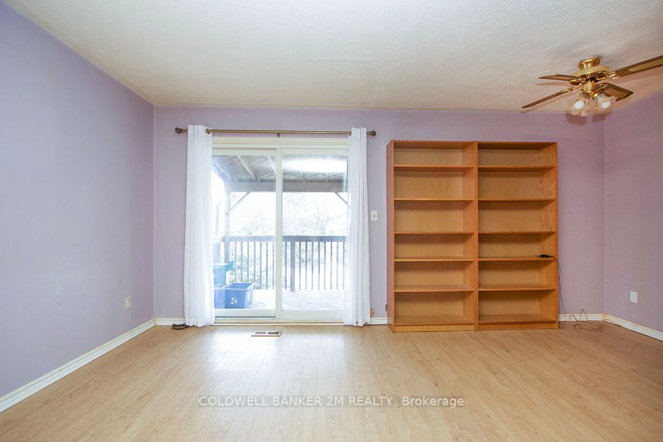 Sliding Glass Door Leading to the Covered Deck.