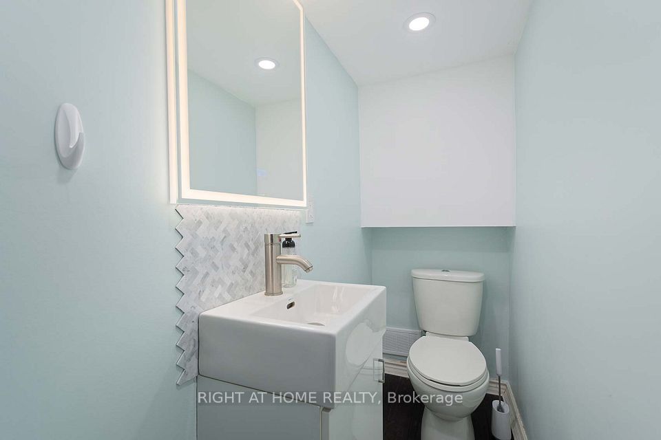 Lower Powder Room With LED Mirror