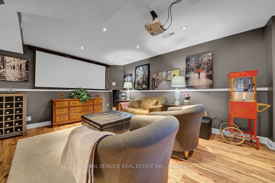 Rec Room pot lights & hardwood floors
