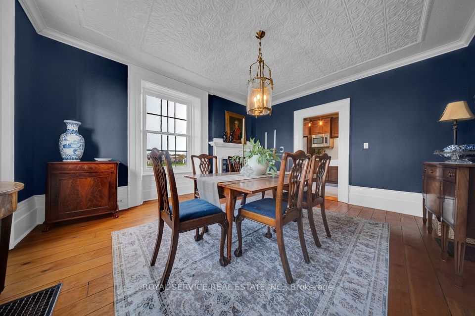 Dining Room with Tin Ceiling & Original Wood Trim