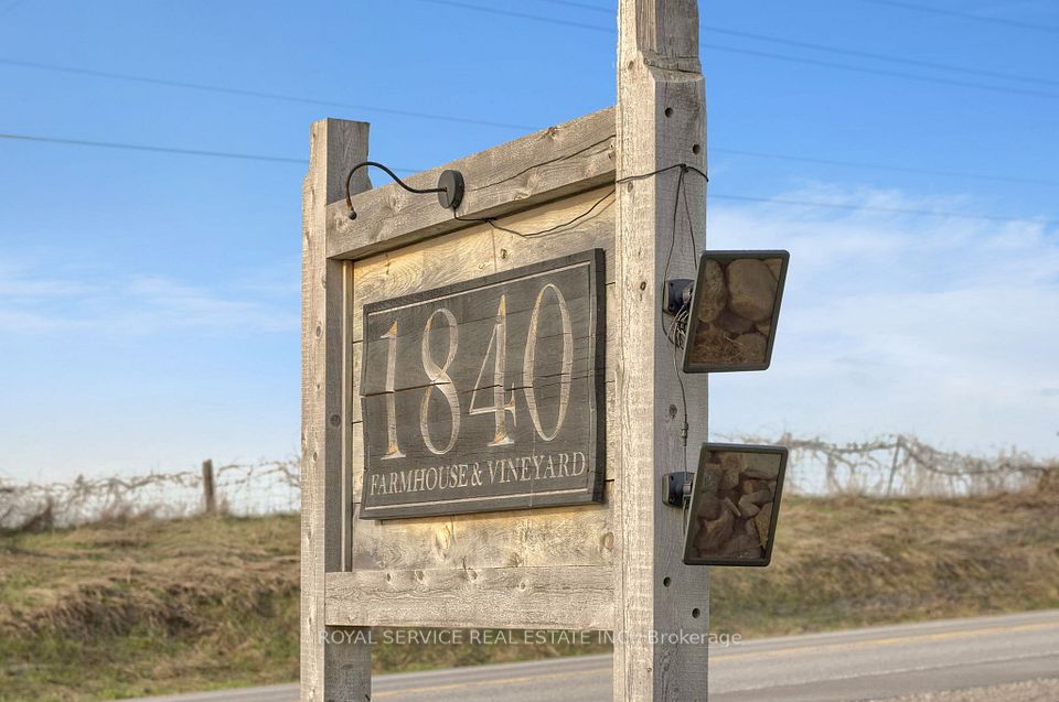 Road side signage of family owned & run Vineyard