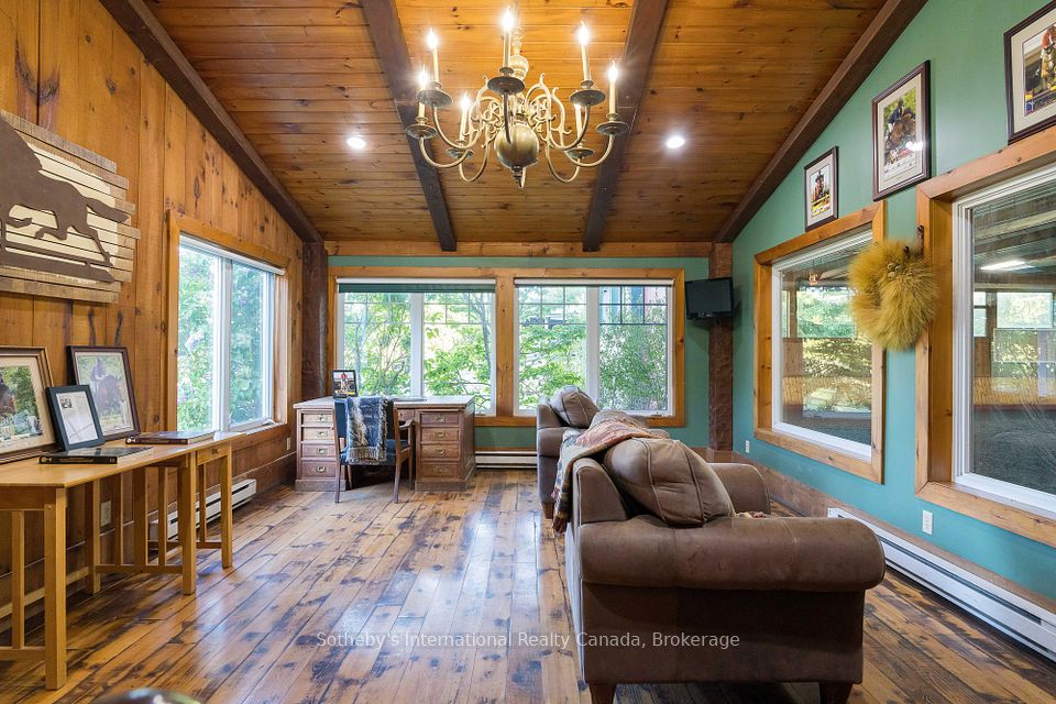 Viewing lounge with sinks, stereo system, hardwood