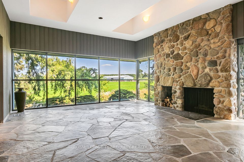 Fireplace and View of Pond in Family Room