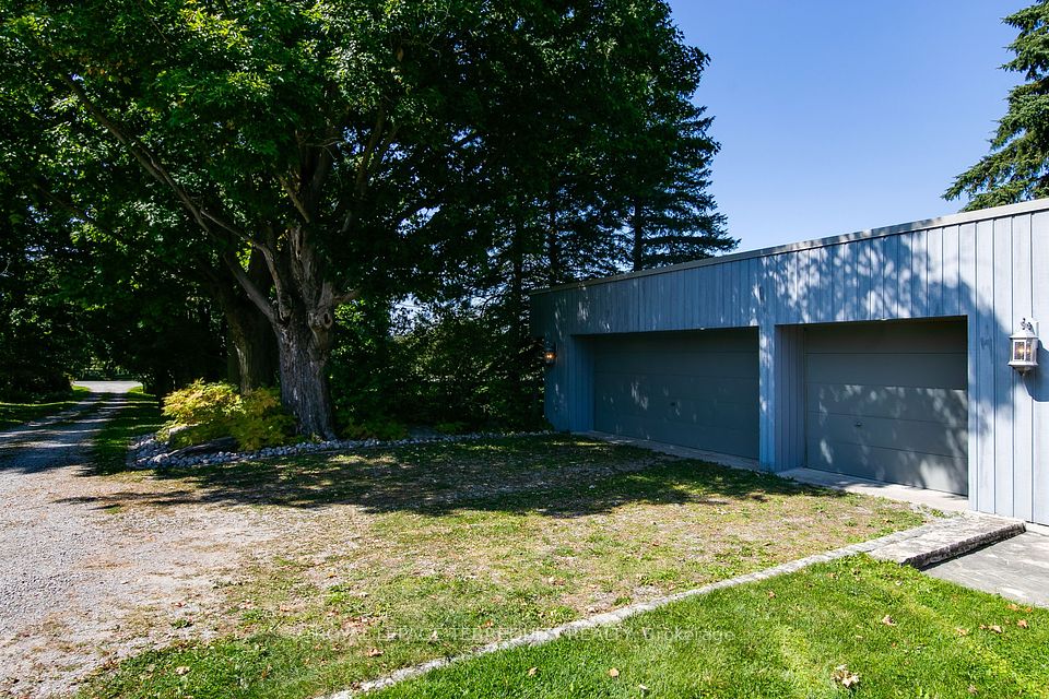 Detached Heated Triple Garage with Storage