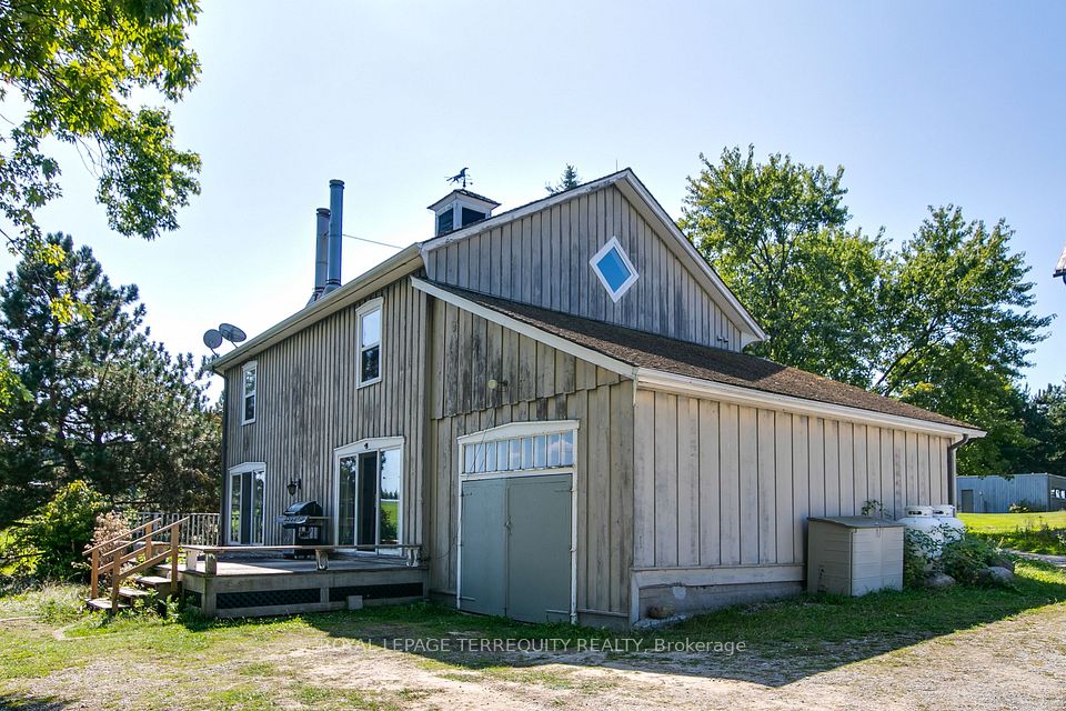 Rear of Home Has Built In Garage