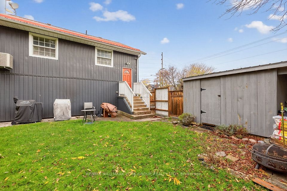 Entrance to upper level & Shed