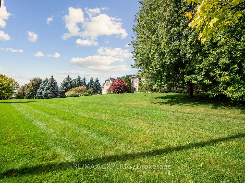 Large Picturesque Green Grass Grounds!  2.03 Acres
