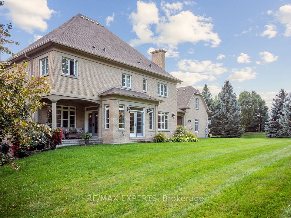 Rear View of the Residence with Two Cozy Patios!