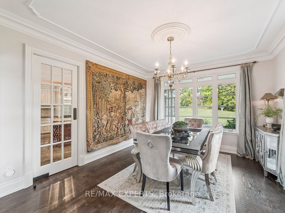 Dining Room ,French Door,Mouldings, Large Window!