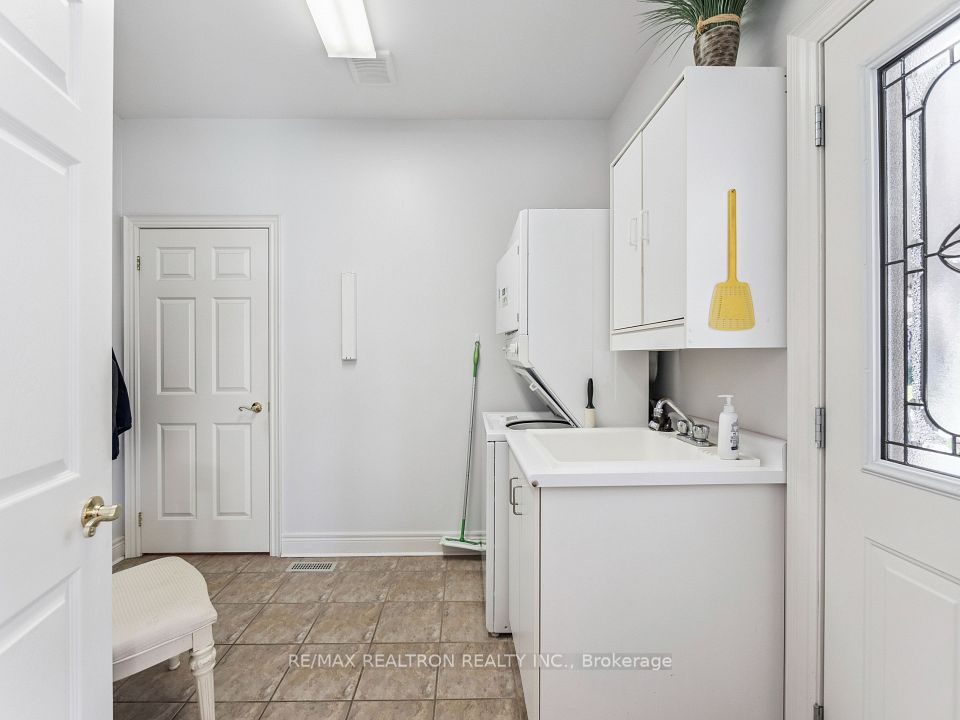 Laundry Rm With stackable Washer & Dryer.