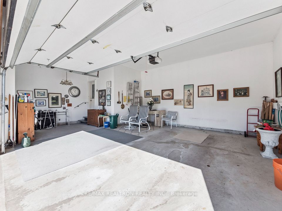 Finished Garage With Area To Relax After Golf