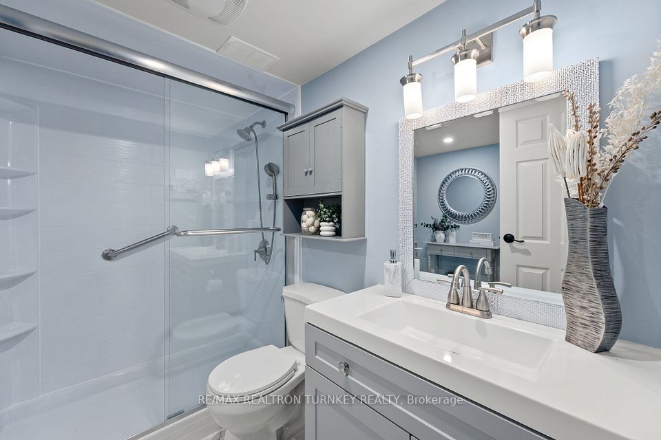 Updated washroom with glass shower