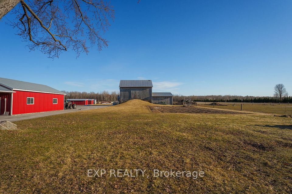 Large Barn & Fenced Animal Pastures