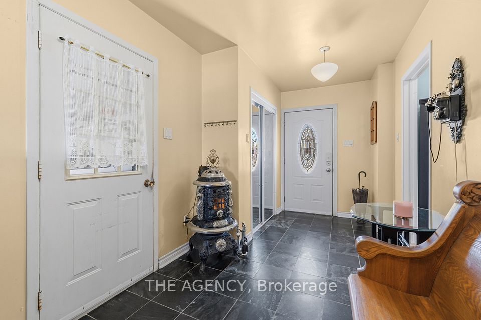 Foyer w/ a coat closet & access to garage