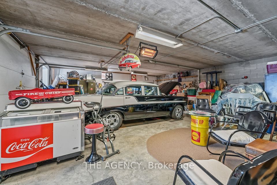 Lower garage fits two cars, single garage door