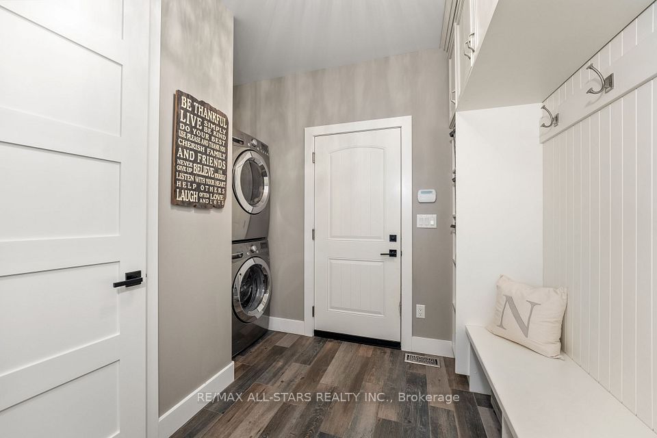 Mudroom & Laundry with 2 pce bath/access to garage