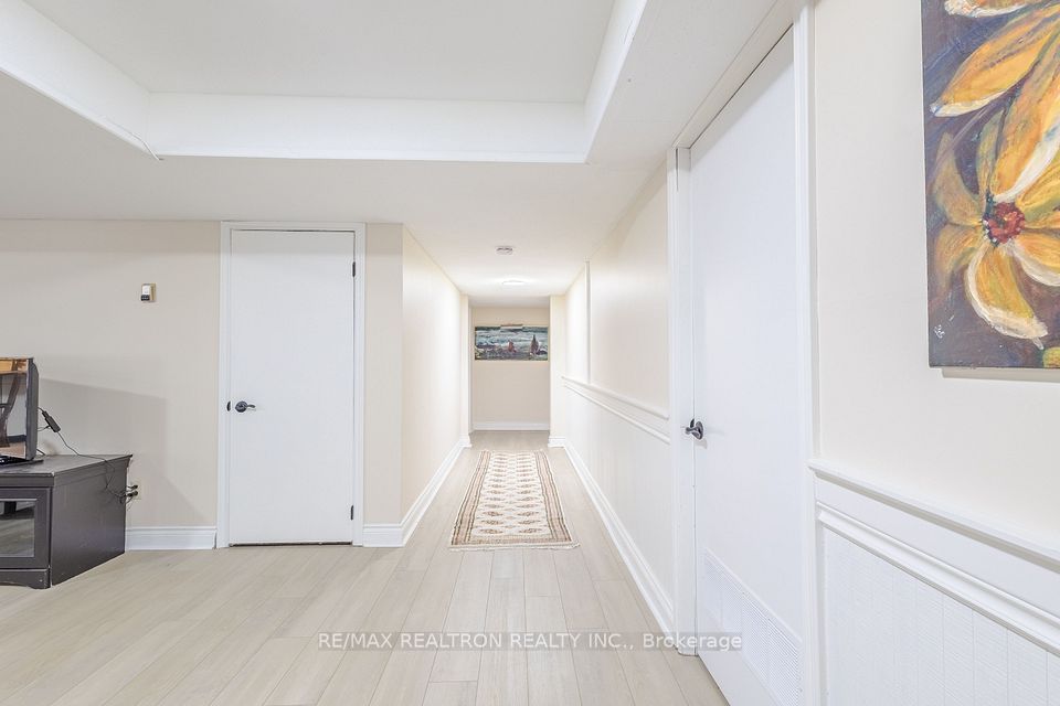 Hallway to bsmt bedroom and utility workshop
